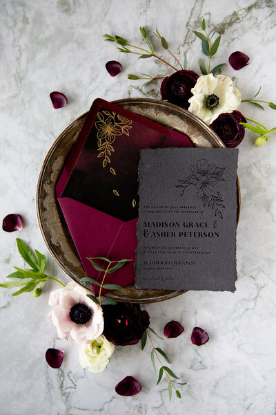 black foil on black handmade paper wedding invitation
