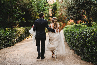 Walking together to the cocktail to celebrate with their guests