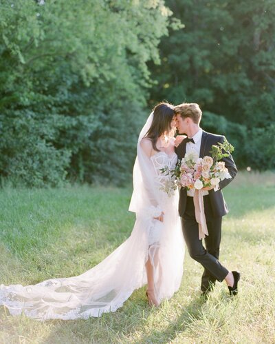 Bride and groom walk up memorial steps at their DC wedding