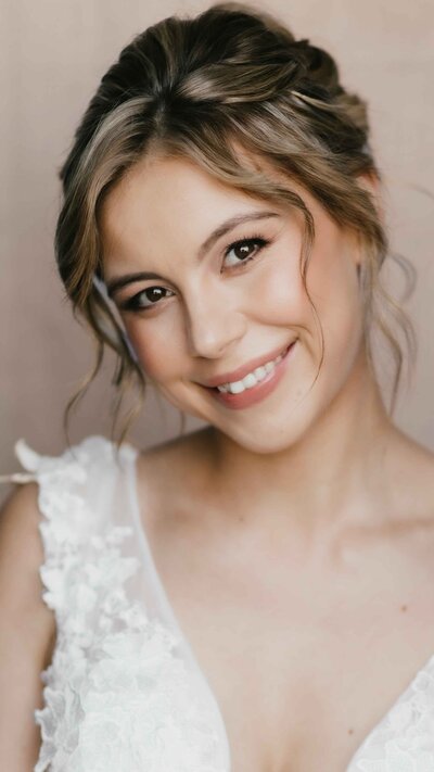 smiling bride with natural make up and soft hair