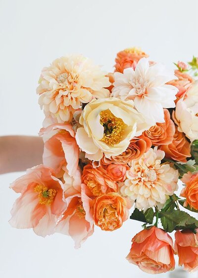 Orange and cream lush flower bouquet