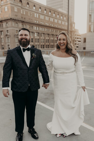 Newly married, these two suck away to a rooftop in downtown omaha for bridal portraits