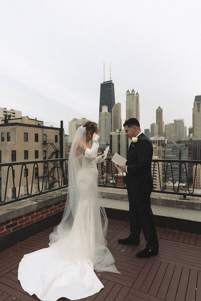Elegant wedding portrait of a bride and groom in a historic venue, beautifully highlighting the timeless sophistication and romance of their special day