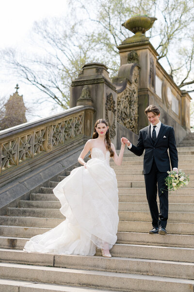 bride and groom smiling at each other