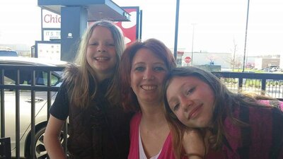 Crystal McClurg with two of her daughter's on a trip to dallas, Texas