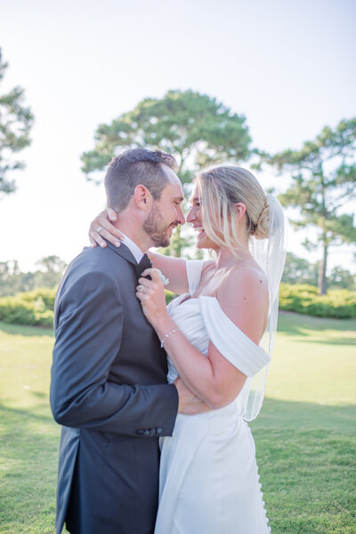 Laughter-filled candid shot of bride and groom.