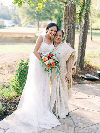 Portrait of bride with her grandma in Indian wedding attire