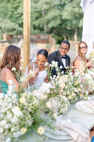 happy guest experience under custom built wedding canopy 