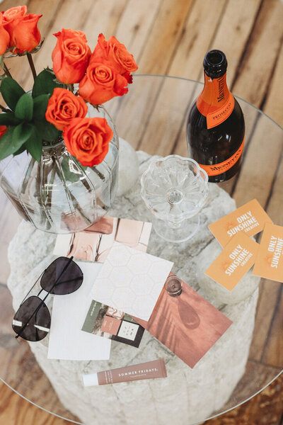 Flat lay of branding elements for a brand and lifestyle photoshoot.