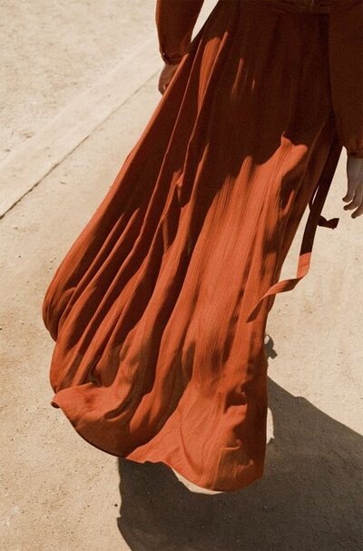 Feminine orange flowing dress