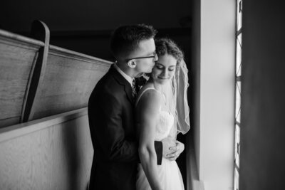 bride and groom embracing in central illinois for their wedding