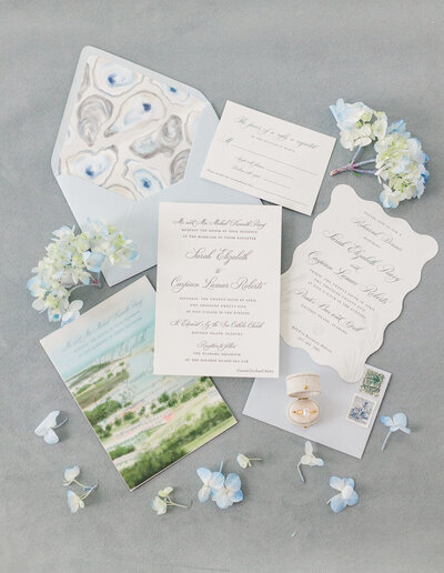 light and airy wedding invitation flatlay