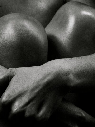 Close up shot of woman's knees black and white