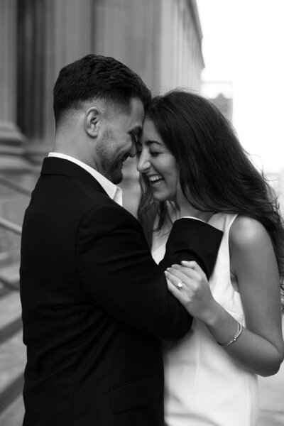 Bride and groom walk up memorial steps at their DC wedding