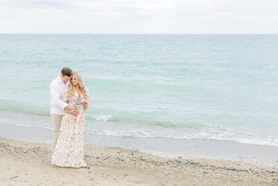 Couple embracing each other at Lighthouse Beach. 
