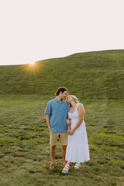 Couple in an open Indiana field for their engagement session
