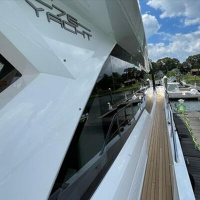 Side view of a detailed yacht docked in the marina