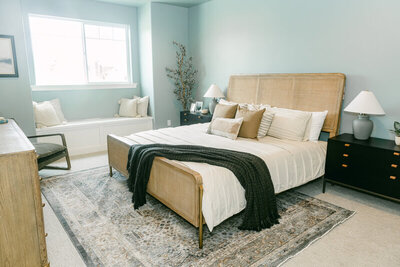 Arini bed display showcasing affordable furniture and interior design services in Utah.