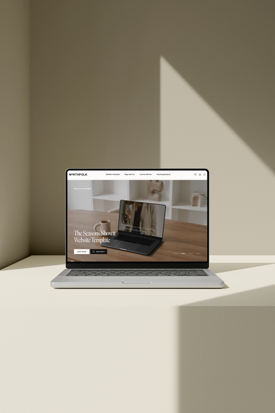 A laptop mockup showing Showit website templates from Northfolk Co, designed for online businesses, service providers, copywriters, photographers, and more 