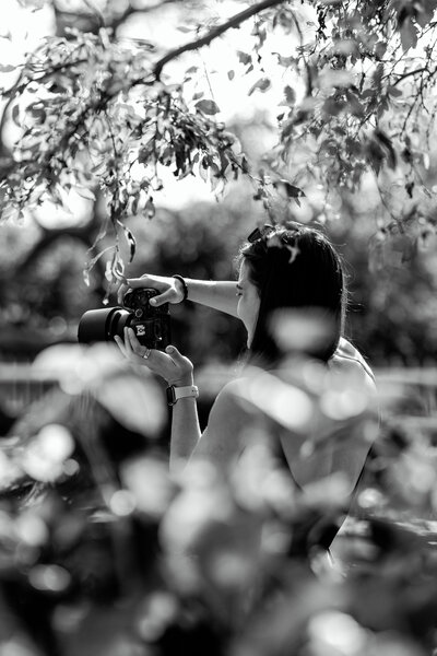 Portrait of Gabrielle Vignola, Boston wedding photographer behind the scenes.