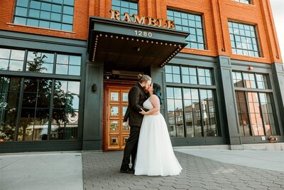 Wedding Couple Kissing Outside The Ramble Hotel
