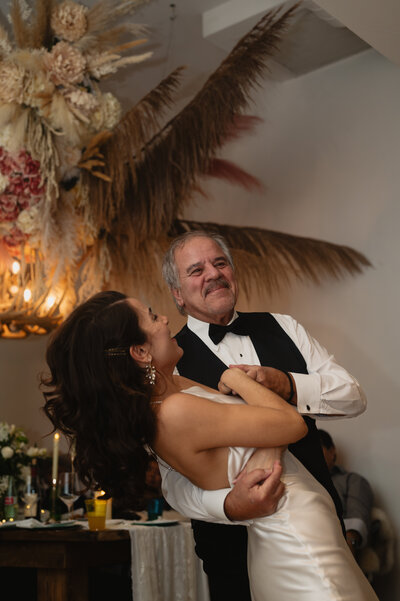 Bride dancing with father at wedding taken by Alma Photo Video