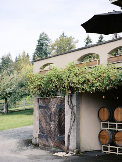 Winery exterior with rustic wooden doors