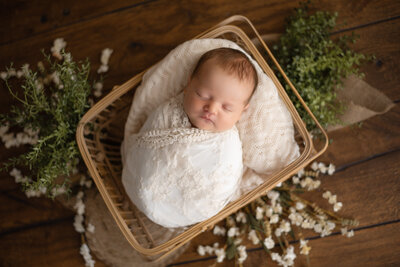 Baby in a basket, spring pose