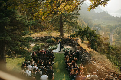couple getting married on cliffside
