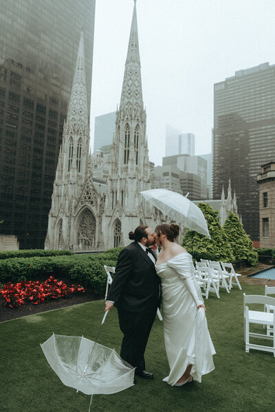 bride and groom kissing on nyc rooftop eloping shot by Elsie Goodman Photography | NYC Elopement Packages