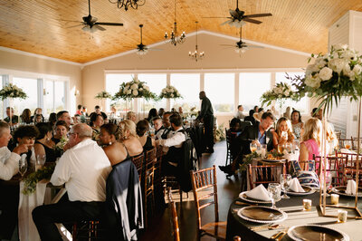 A bride and groom have a dance outside of their churh