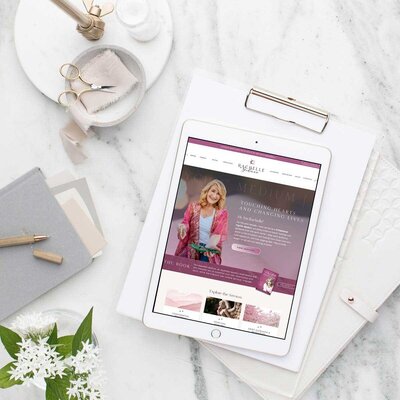Tablet displaying the custom Showit website of Rachelle Gehman, created during a VIP design day with a Showit website designer.