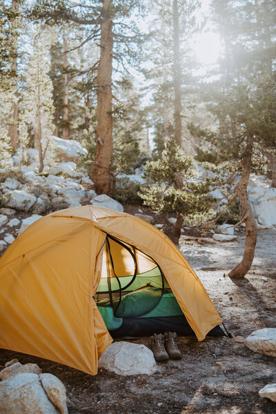 Backcountry adventure photography showcasing mountaineers scaling peaks.