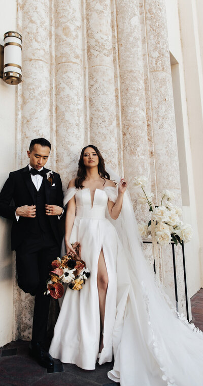 stylish-bride-groom-outside-church
