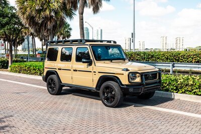 mercedes-g550-desert-sand-professional-edition-for-rent-in-miami-front-quarter-view-from-passenger-008