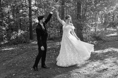 groom spins bride in dress brantford outdoor wedding