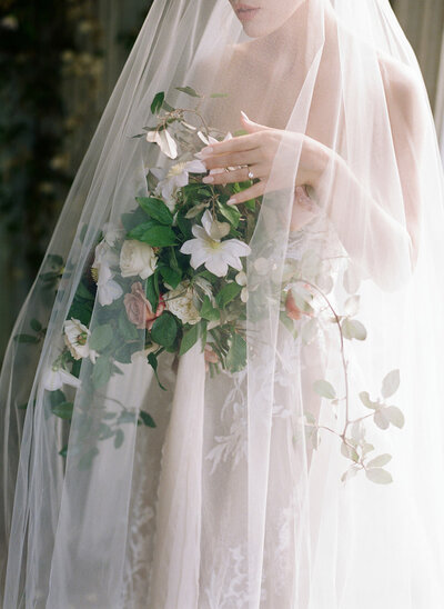 Salubria bride under veil with bouquet Tara Hodges Photography
