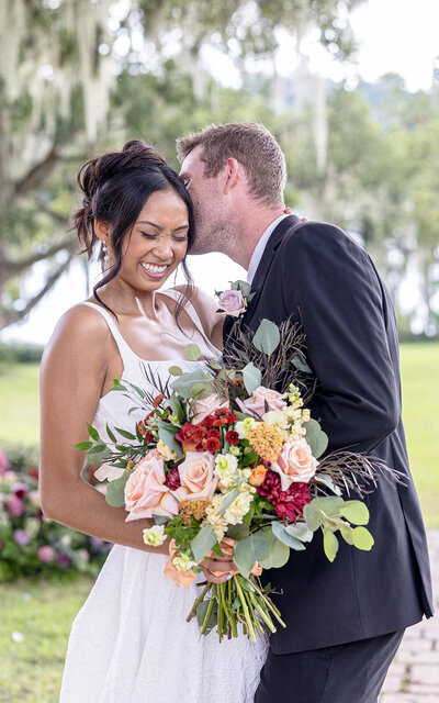 Colorful bouquet in a bride's hand wedding photo in Savannah GA