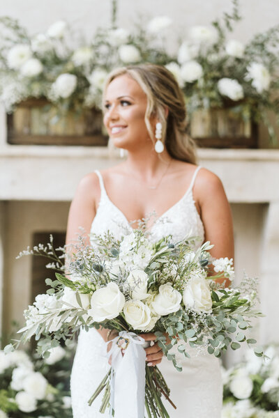 Bride holding a beautiful bouquet at  Stonewood Farms