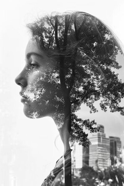 black-white-photo-woman-with-tree-her-hair_662214-429115