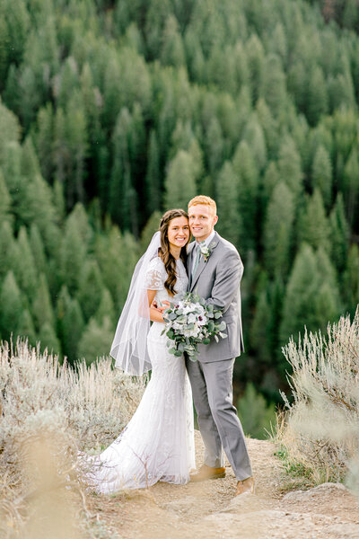 Wedding Couple by Pine Trees in Mesa Falls Ashton Idaho