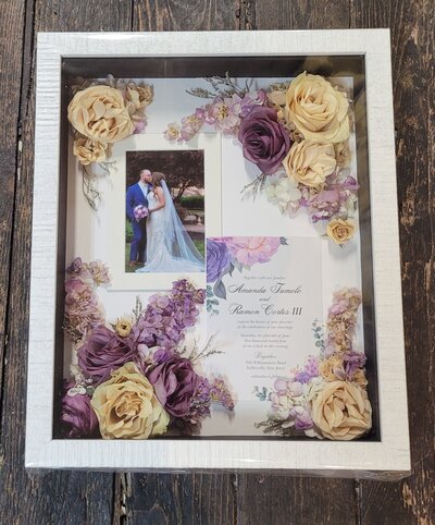 Beautifully preserved wedding bouquet with vibrant flowers, expertly arranged by Leigh Florist