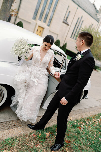 bride and groom posing during sunset