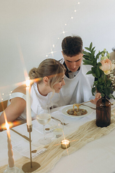 Luxury wedding in Europe – sophisticated bride in a modern wedding gown and groom in a timeless suit.