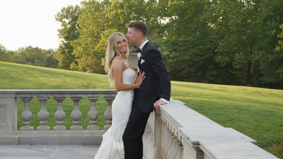 Husband holding wife's hand at the Belmont Manor