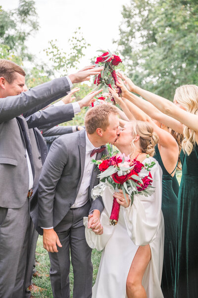 fun full bridal party portraits at garden wedding venue