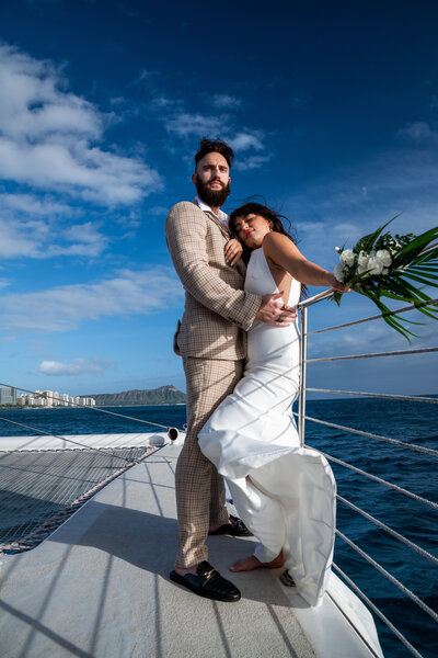 Bride and groom on a yacht in Oahu