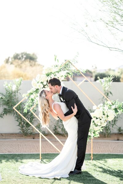 Wedding at Andaz Scottsdale Resort Albers Lawn Couples first kiss at ceremony area