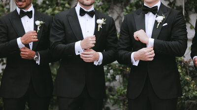 A group of groomsmen in tuxedos captured by a Texas wedding videographer.
