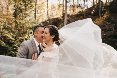 Bride and groom sharing a kiss during their Yellowstone elopement.